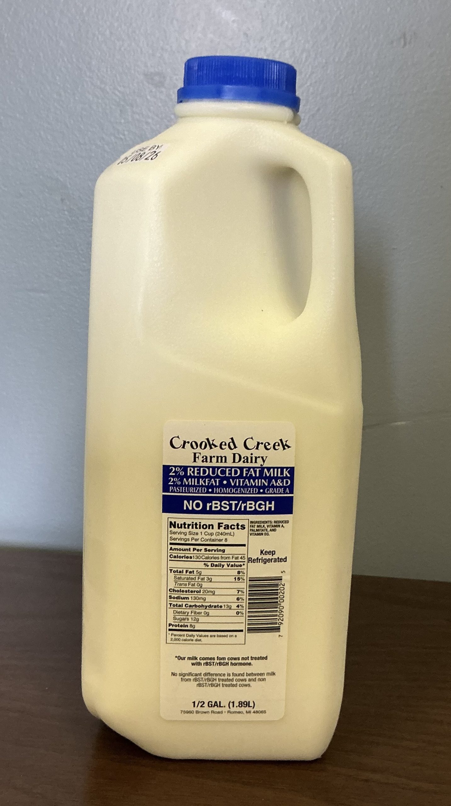 Crooked Creek Dairy 2 reduced fat milk half gallon scaled