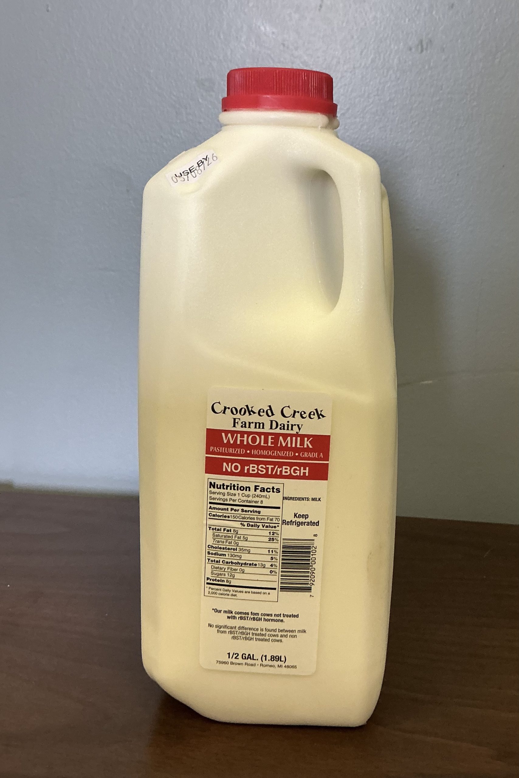 Crooked Creek Dairy Whole Milk half gallon scaled